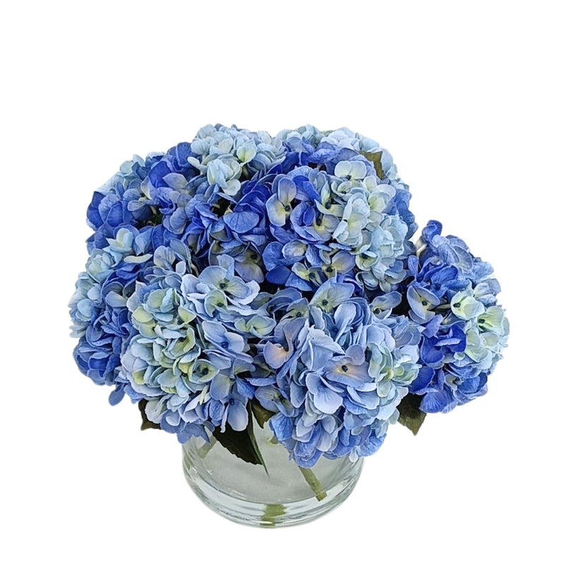 Hydrangea Blue in Cylinder Glass Vase. Top view of silk flower arrangement from www.plantcouture.co.za