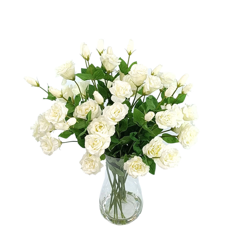 White Lusianthus Silk Flower Arrangement in Waisted Glass Vase. Top view. Plant Couture.