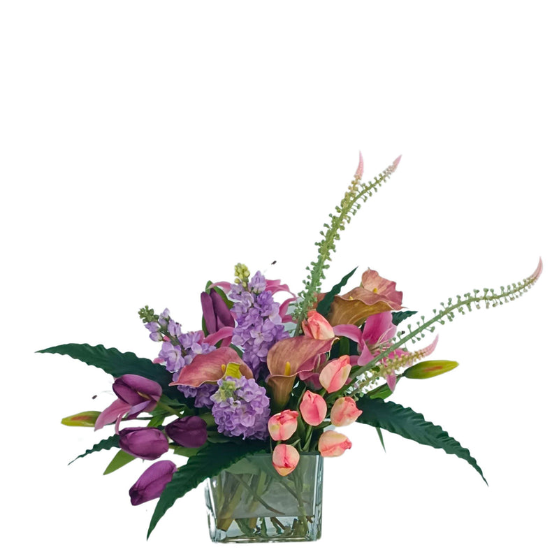 Mix Arrangement Arum Lily Tulip Snapdragon. Top view of silk flower arrangement available from www.plantcouture.co.za. Shades of pink, purple and green.