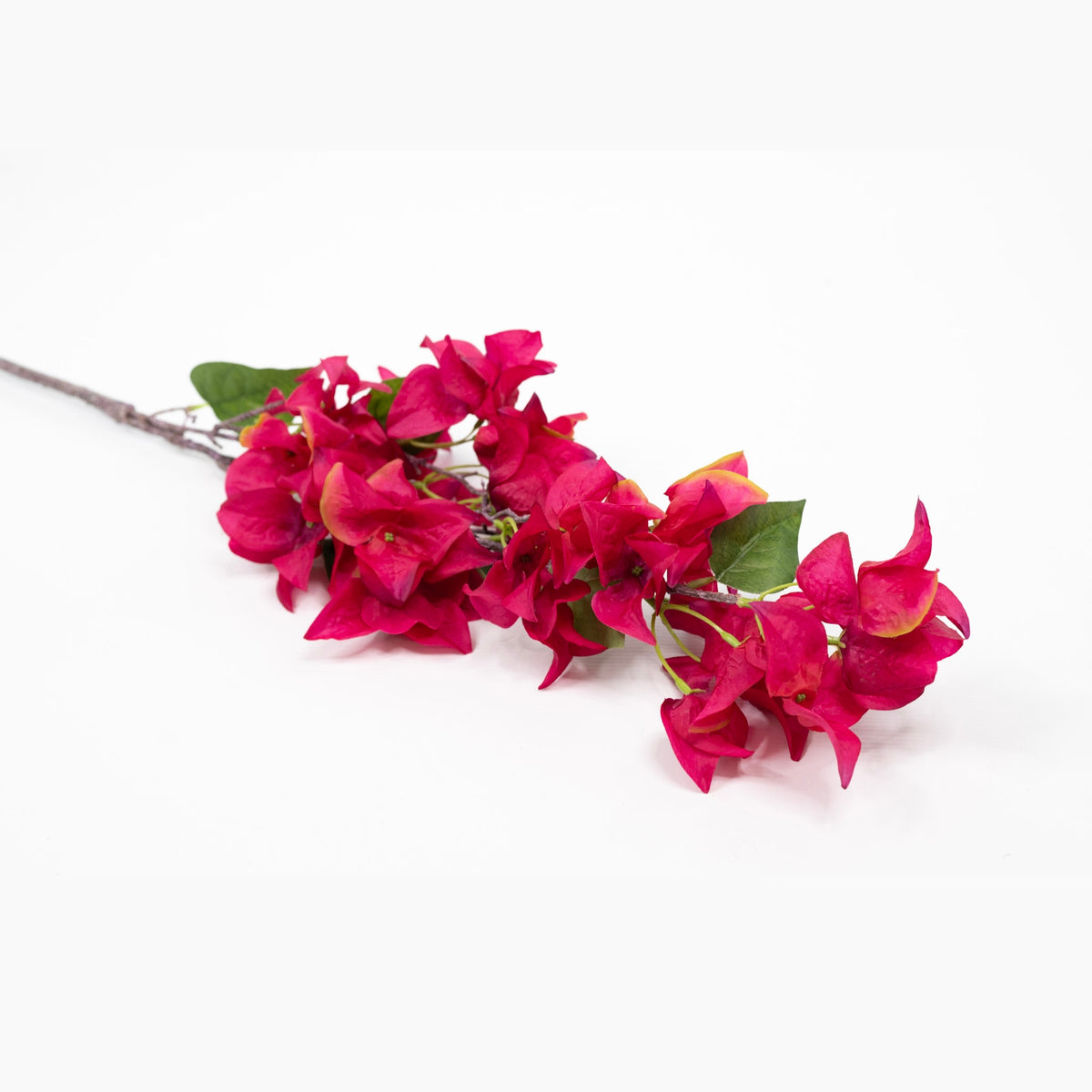 Bougainvillea Cerice Silk Flower Stem - 103cm. Close up & lying down view. Available from Plant Couture.